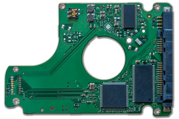 绿色机械硬盘电路板的局部特写图片下载