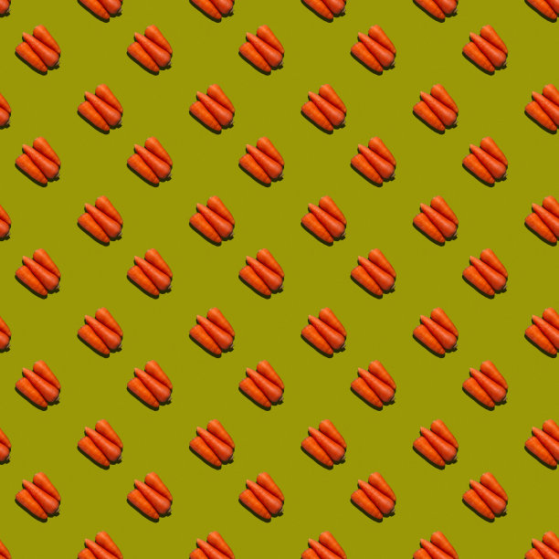 无缝模式从新鲜多汁的胡萝卜上统一的颜色背景。图片下载