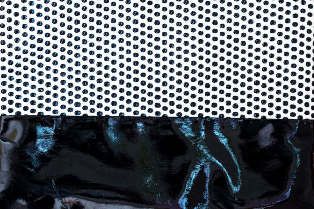 以点纹和漆皮为背景的织物图片下载