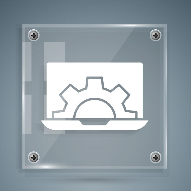 白色笔记本电脑和齿轮图标隔离在灰色图片下载