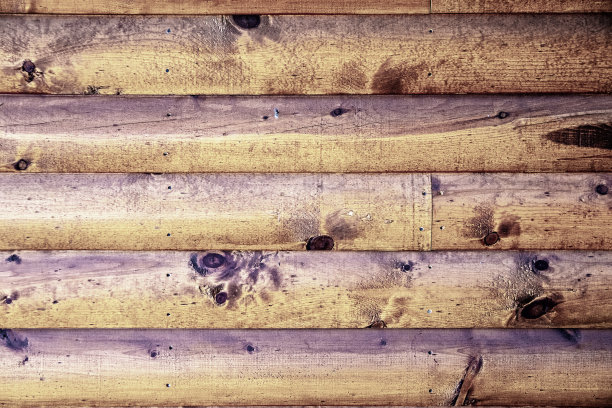 不饱和的复古木屋墙背景与水平的原木图片下载