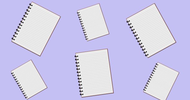 螺旋装订的笔记本漂浮在淡紫色的背景上图片下载
