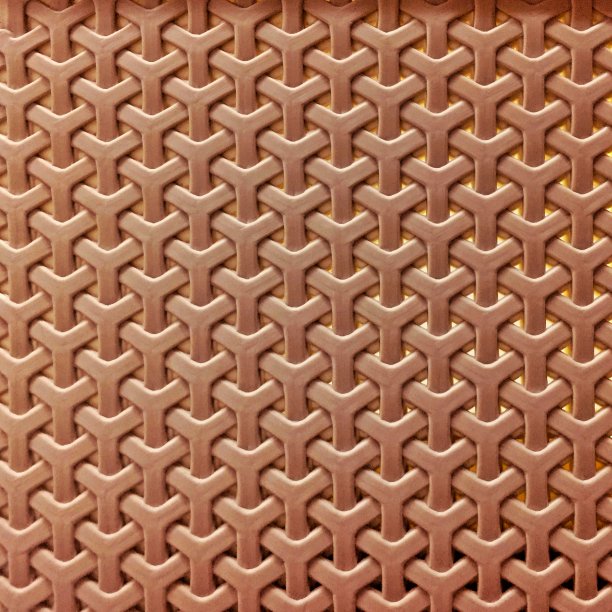 美丽编织棕色背景。图片下载