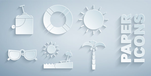 在沙滩上放置遮阳伞和太阳眼镜图片下载