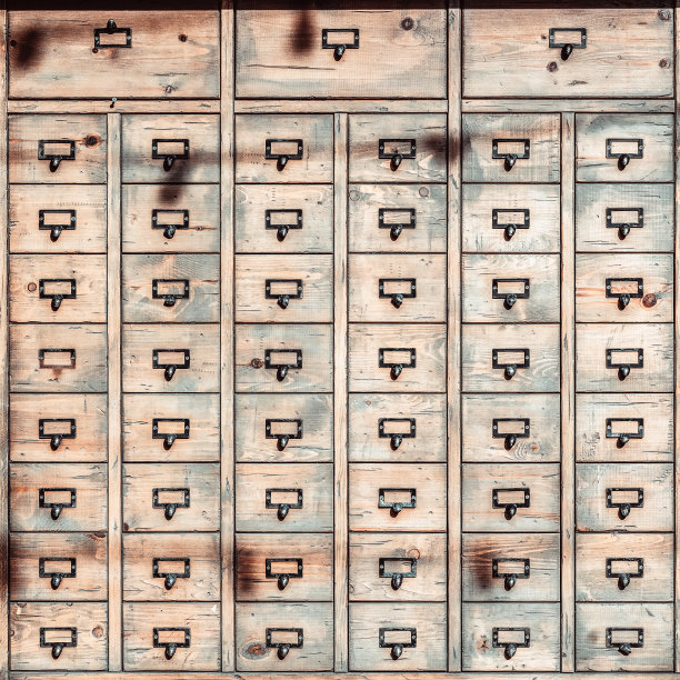 有很多抽屉的旧木柜，复古的背景图片下载