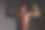 苗条和肌肉发达的年轻男子与他赤裸的躯干。男人开始肌肉生长阶段。图片下载