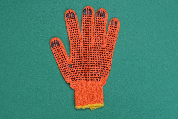 一只红色布制工作手套图片下载