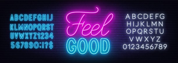 感觉不错的霓虹灯字母在砖墙背景。图片下载