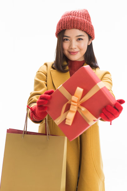 青年女人拿着购物袋图片下载