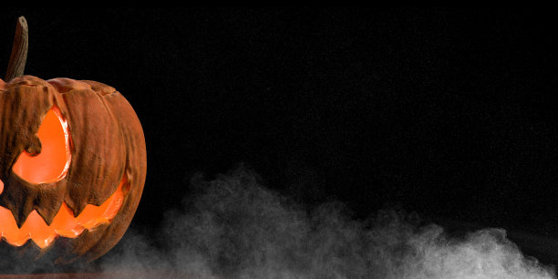 一个可怕的微笑雾蒙蒙的万圣节南瓜的一部分，有很大的复制空间。图片下载