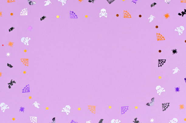 由五彩纸屑制成的头骨、蜘蛛、蜘蛛网、蝙蝠和鬼魂图片下载