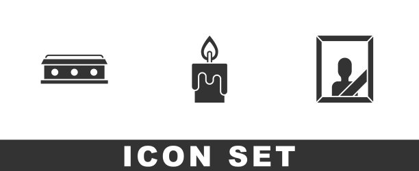 放置有十字架、蜡烛和丧服的棺材图片下载