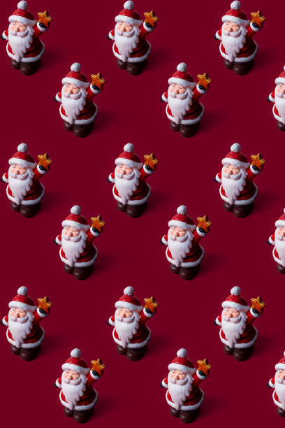 圣诞老人的圣诞图案在红色背景与复制空间。图片下载