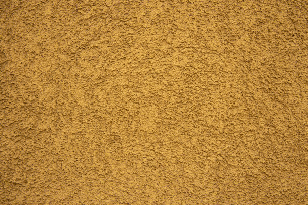 墙面石质物体表面的黄色纹理简单的背景图片与空白的复制空间图片下载