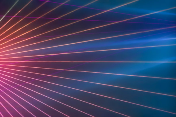 五颜六色的周年纪念激光秀，空气中弥漫着烟雾。政党背景图片下载