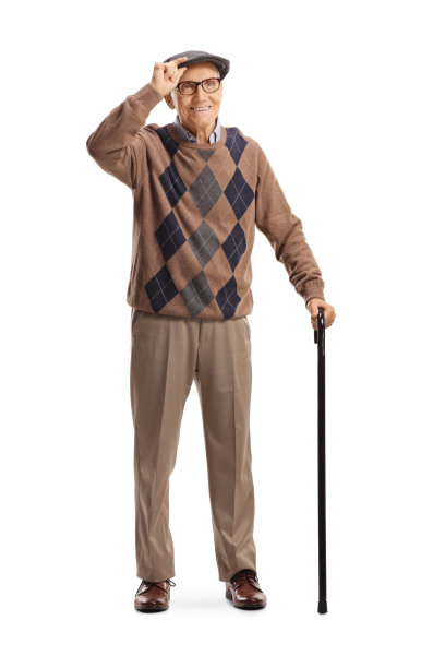 老人拄着拐杖，戴着帽子打招呼图片下载