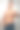 一个英俊的年轻男子光着上身站在摄影棚里，竖起大拇指图片下载
