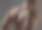 一个不知名的男人独自站在摄影棚里，赤裸上身图片下载