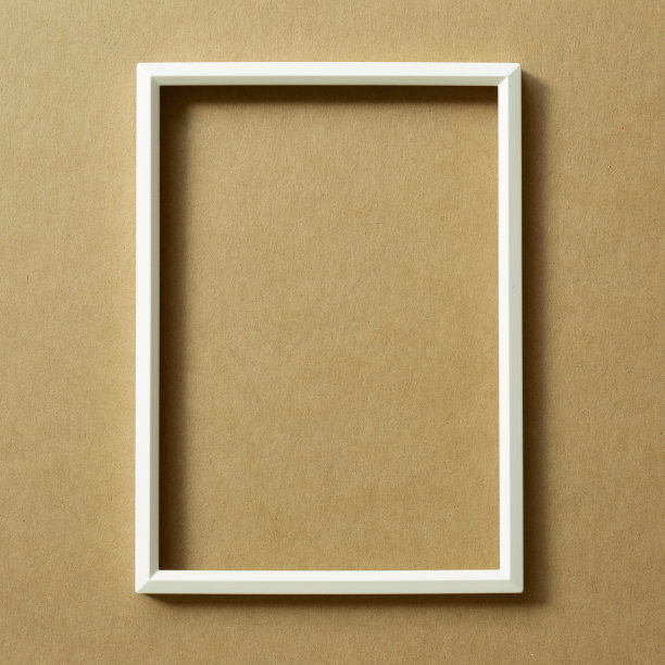 白色相框，棕色背景。俯视图，复制空间图片下载