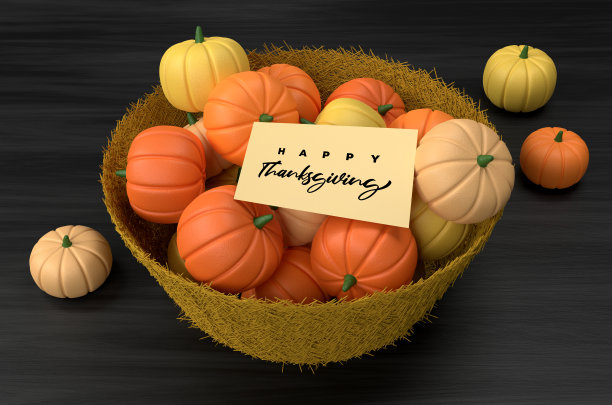 感恩节的背景。南瓜在篮子里。图片下载