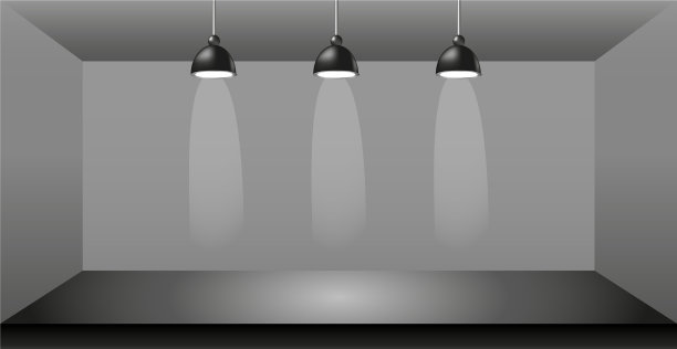 现实的黑暗工作室与聚光灯照明图片下载