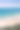 美丽的海景，沙滩，天空和海浪，悬崖和岩石。图片下载