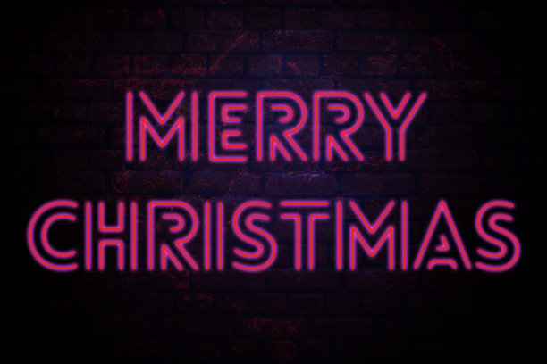 节日横幅题词圣诞快乐。霓虹灯背光的圣诞快乐题词。图片下载