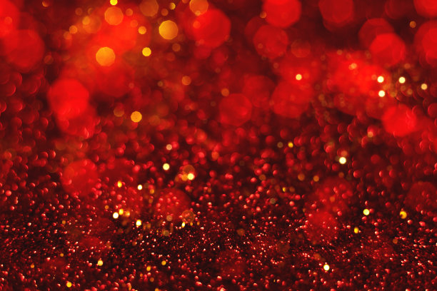 红色和金色闪光的散景背景图片下载