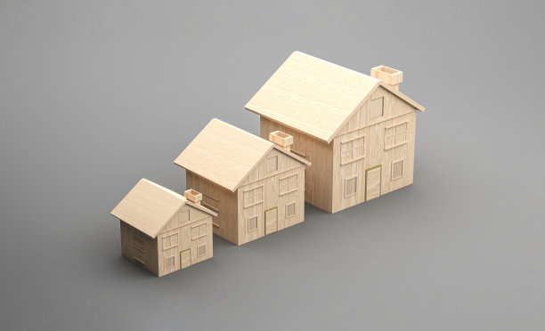 灰色背景上的微型房屋图片下载