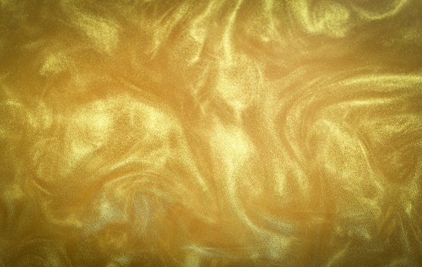 金色闪光抽象背景。迷人的金光闪闪的神奇明亮的节日背景的新年派对装饰图片下载