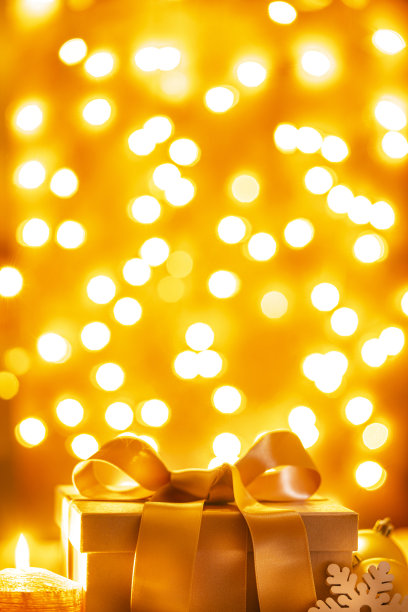带离焦灯的金色圣诞礼物图片下载