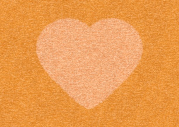橙色毡织物背景与一个大的心脏符号图片下载