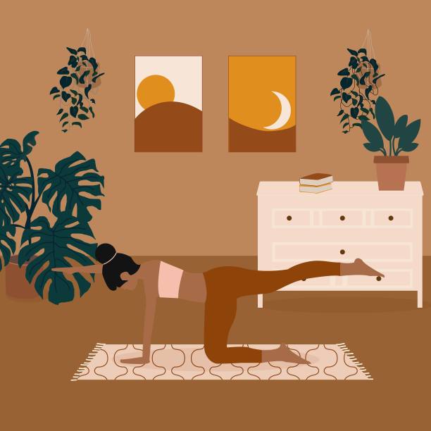 年轻漂亮的女人在做瑜伽图片下载