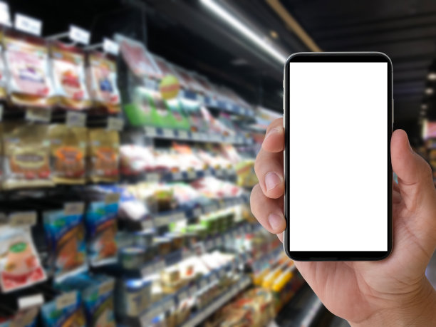 手拿着智能手机图片下载