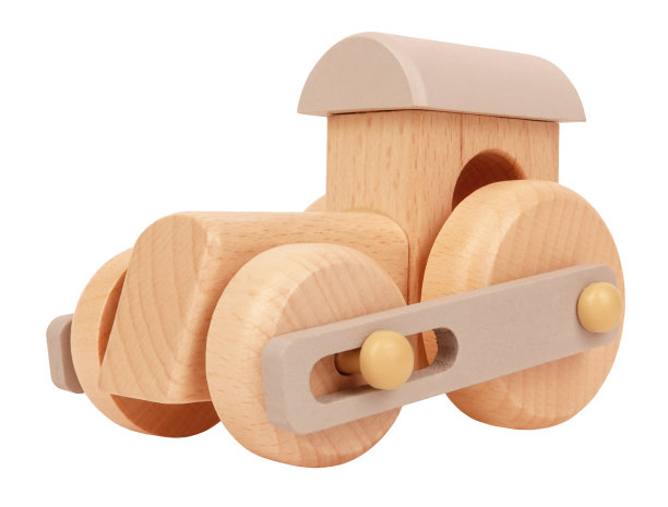 木制玩具火车机车被隔离在白色背景上。童年的回忆或送给孩子的礼物图片下载