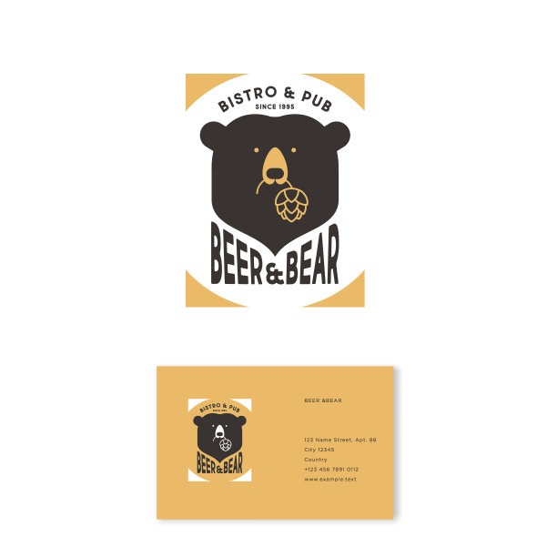 啤酒和熊的象征。熊的头和字母。熊养着啤酒花。的名片。图片下载