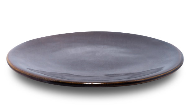棕色圆形陶瓷板孤立在白色背景上。图片下载