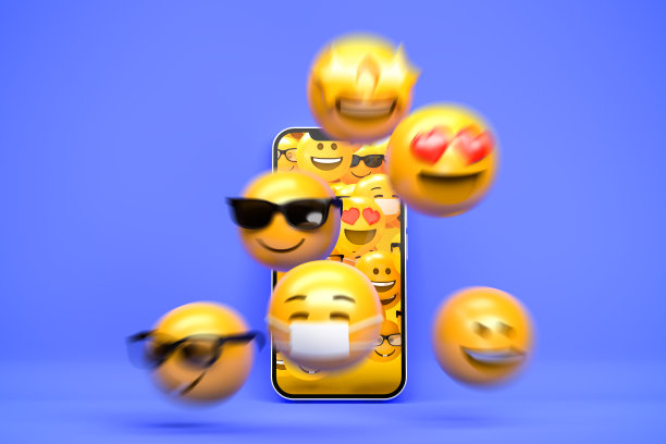 社交媒体概念:从手机中逃离的3d表情符号。动态模糊。图片下载