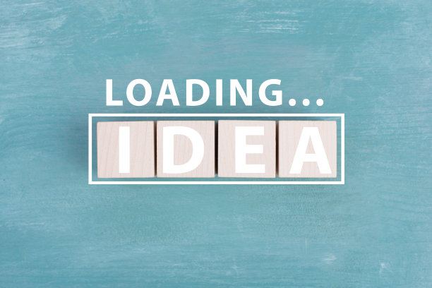 这个词是站在白色的木制小熊上，蓝色的背景，装载符号图片下载