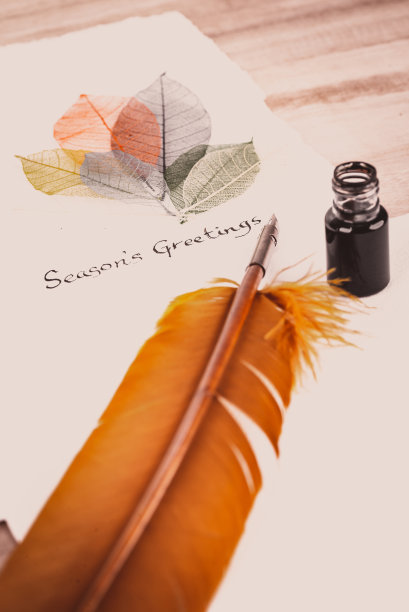 手写的季节问候文本粗糙的纹理纸与复古的效果图片下载