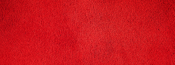 红色绒面革质地。微距照片的红色天鹅绒纹理。图片下载
