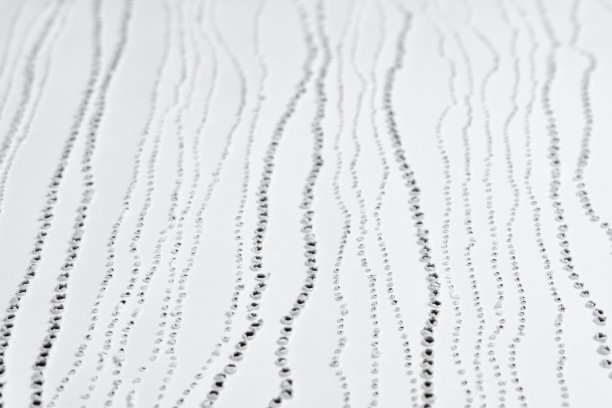 穿孔纸的纹理。简单点的模式。图片下载