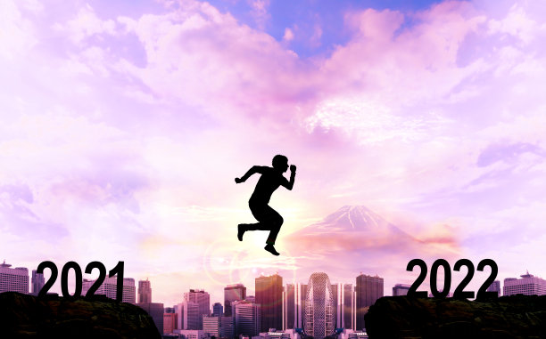 2022年新年贺卡-跳楼者剪影，城市景观和第一次日出图片下载