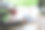 女设计师拿着咖啡杯和笔记本电脑工作。图片下载