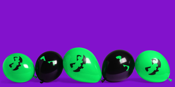 一排紫色背景的万圣节气球图片下载