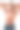 一名上身赤裸的英俊年轻男子在白色背景下摆姿势的画室肖像图片下载