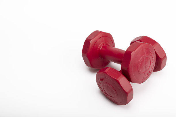 抛弃了白色背景下的红色哑铃，忽视了保健理念图片下载
