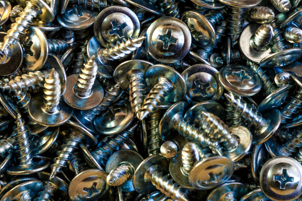 螺栓和螺母。各种螺丝的特写。用于背景，俯视图。图片下载