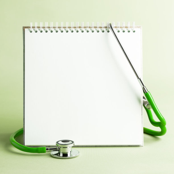 医学概念。带听诊器的空白螺旋笔记本(复印空间)图片下载