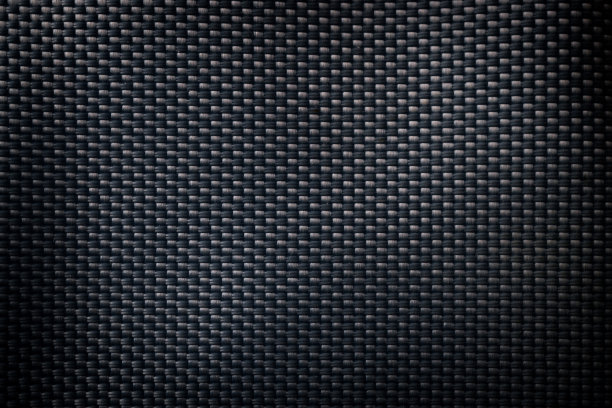 网状黑色纹理。深色聚酯纤维材料，用于运动布或抽象性织物背景。合成图案的背包和运动器材。图片下载